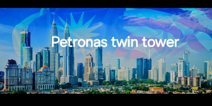 Imagine standing at the base of two colossal, gleaming structures that pierce the sky